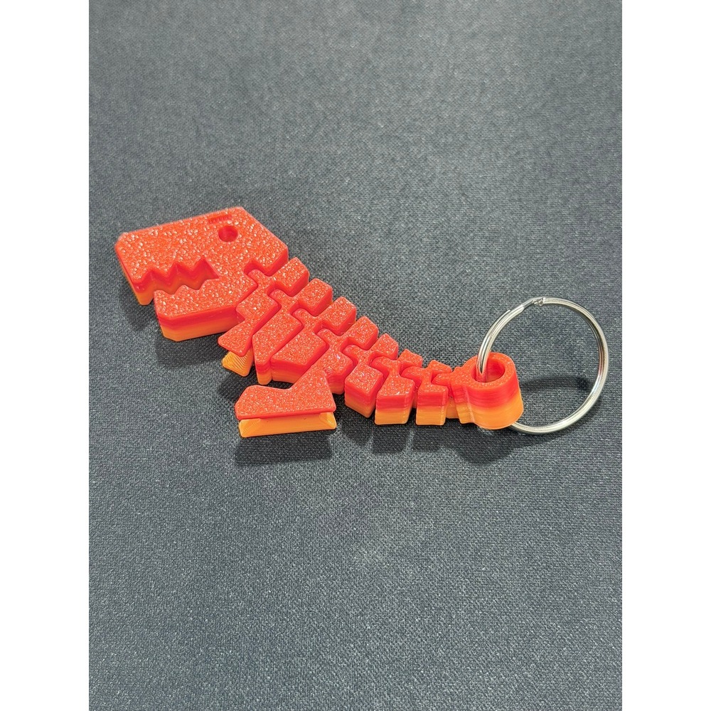 3D Printed Articulated T-Rex Keychain Orange Red Gradient Flexible Dinosaur Toy - Picture 4 of 4